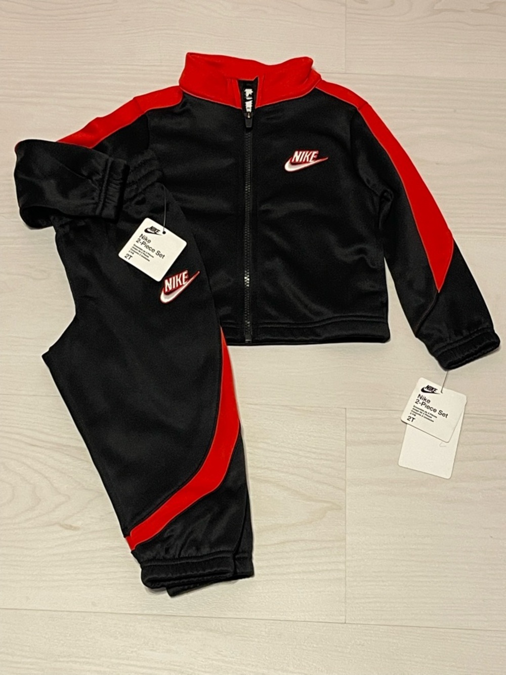 Nike Black and Red Kids Two-Piece Track Set